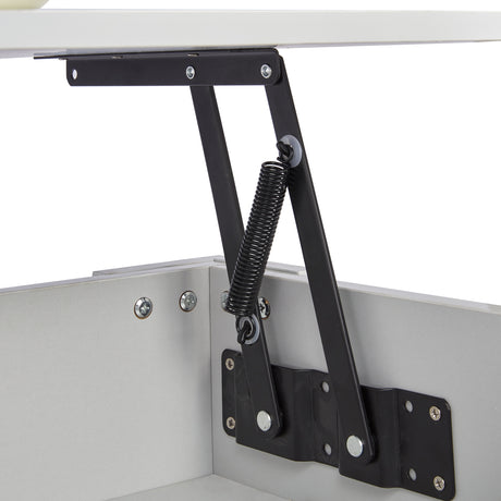 Close-up of lift top mechanism on high gloss lift top coffee table with hidden storage shelf. Features black metal spring hinge for smooth lifting.