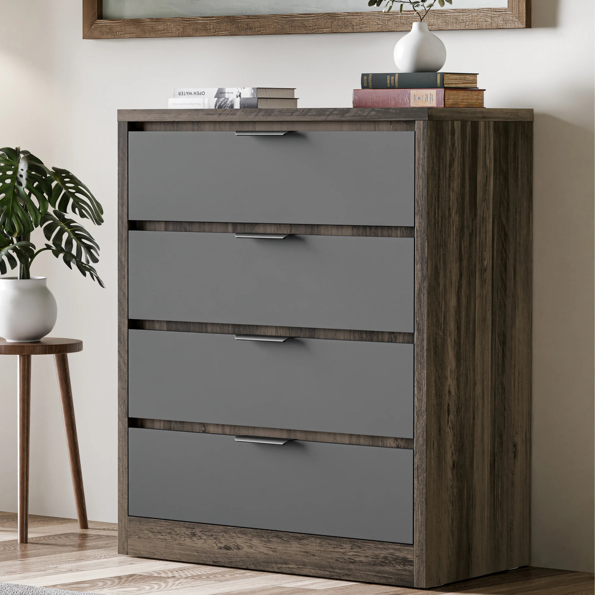 Grey finish 4 chester drawers with four drawers, placed in a modern room with decorative items on top
