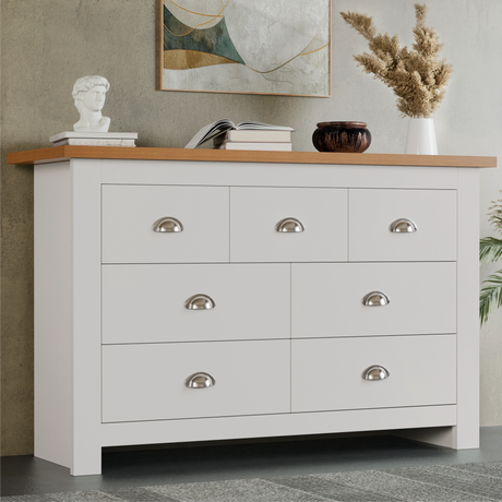 White shaker-style 4+3 chest of drawers with brushed handles from the furniture set including wardrobe and bedside table set
