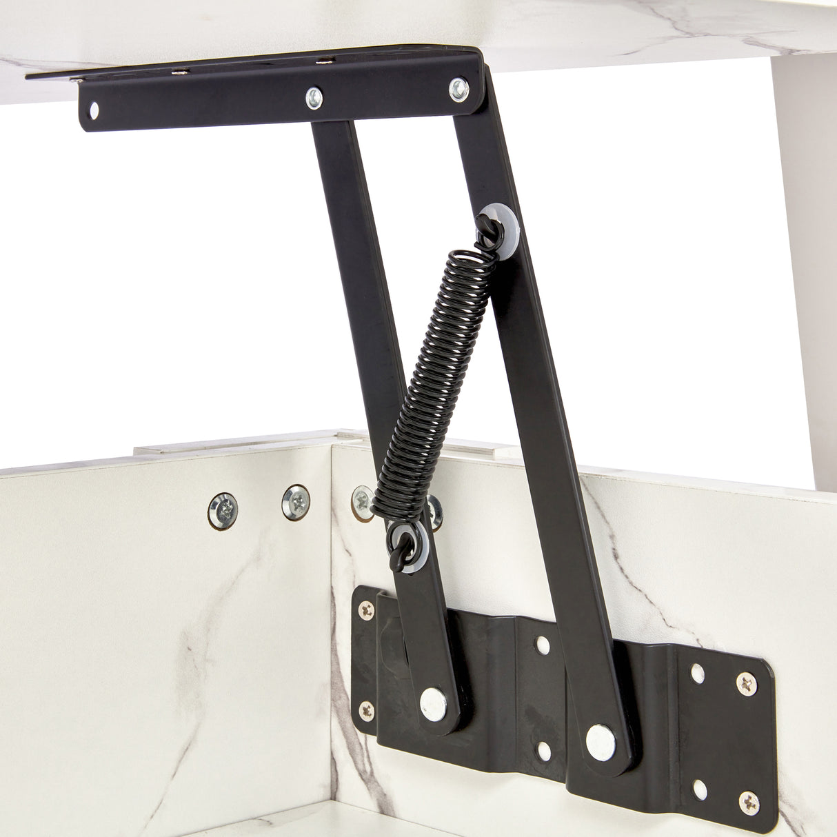 Close-up of lift top mechanism on high gloss lift top coffee table with hidden storage shelf. Features black metal spring hinge for adjustable height.