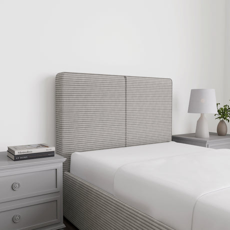 Corduroy ribbed velvet upholstered ottoman bed frame with storage in light grey, featuring a tall headboard and side lift design. Ideal for modern bedrooms.