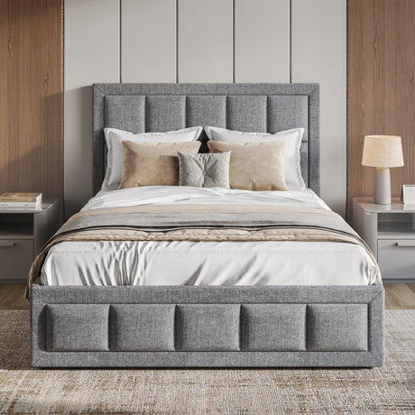 Gray upholstered bed with white bedding and decorative pillows in a bedroom setting.