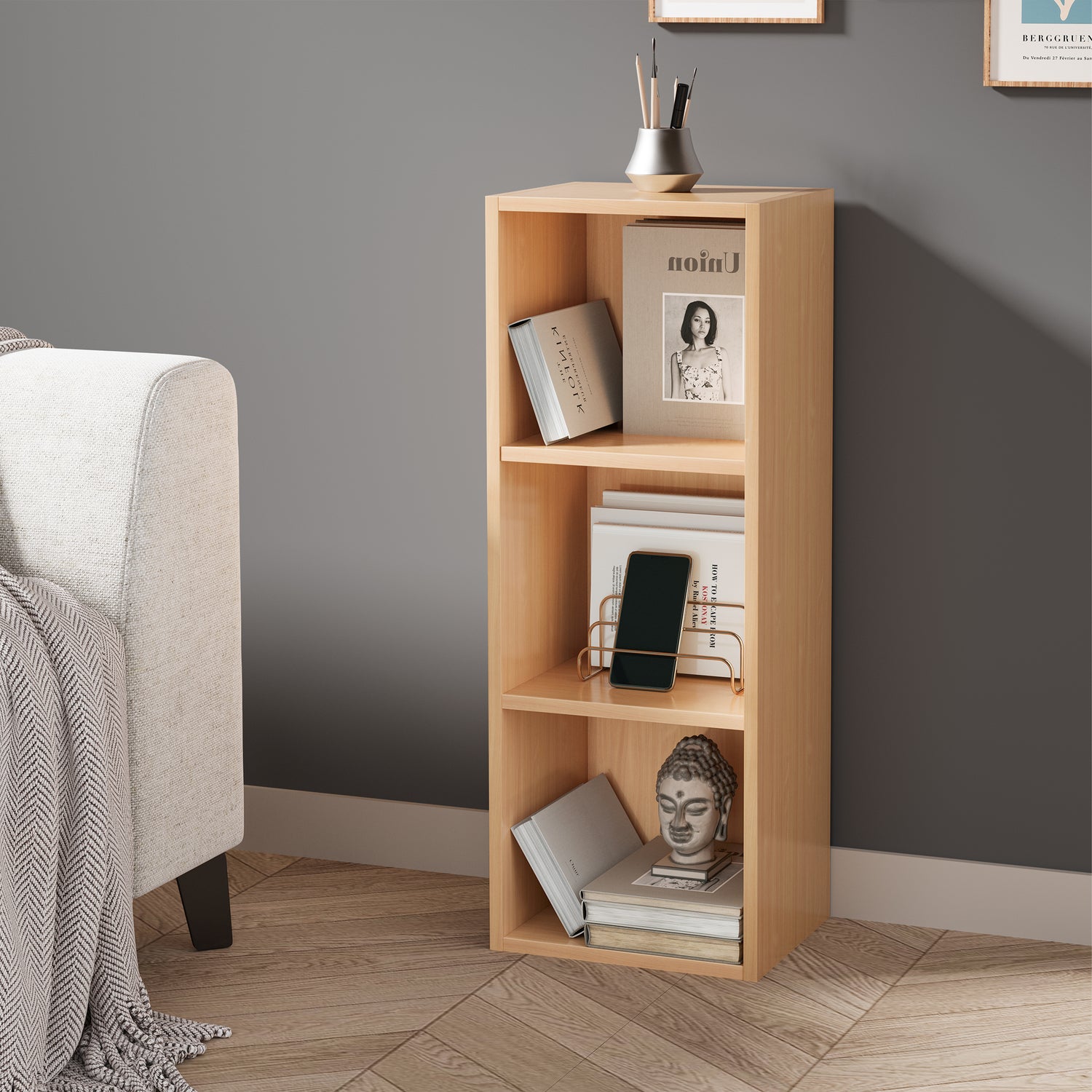 angled front view of beech 3 tier bookcase with books and art, perfect for stylish home storage