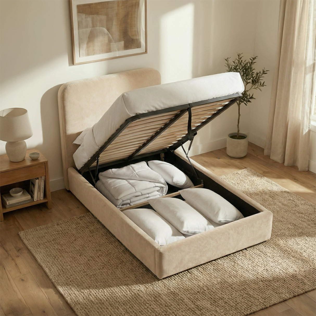 Single beige velvet ottoman bed lifted to reveal under-bed storage compartment with mattress support frame