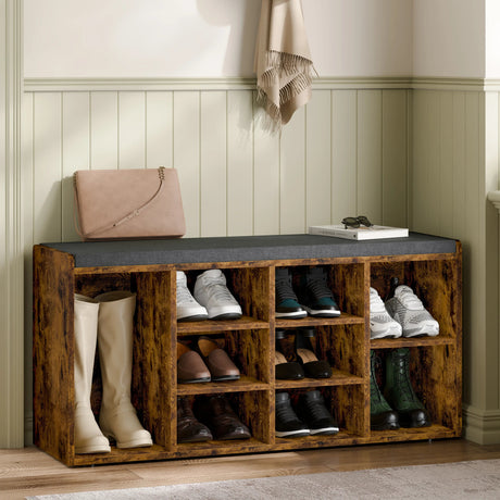 Hallway shoe storage bench with cushion and adjustable shelves in rustic wood finish, ideal for organizing boots and shoes in entryways or mudrooms.