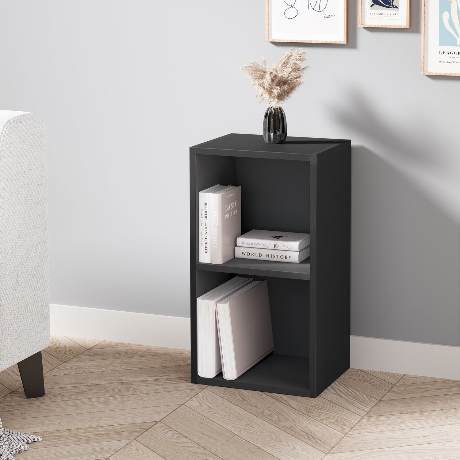 angled front view of modern black 2 tier bookshelf with stylish decor and books, perfect for bedroom or hallway styling