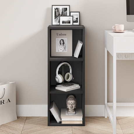 front view of black narrow shelving unit neatly organised with books, fitting perfectly in compact spaces