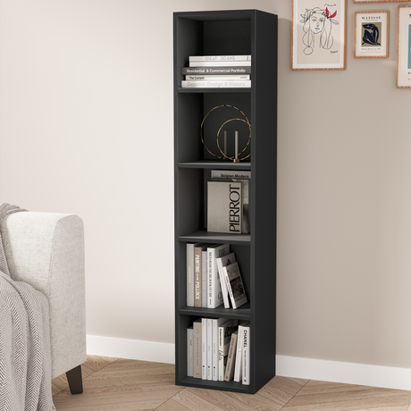 angled front view of 5 tier black bookcase shelving unit filled with books and stylish decor