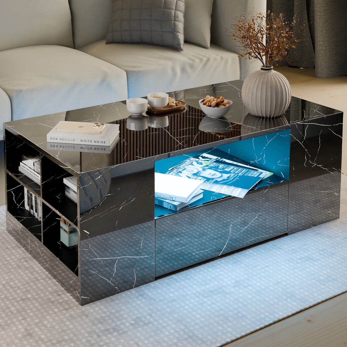 Modern coffee table with decorative items in a living room setting