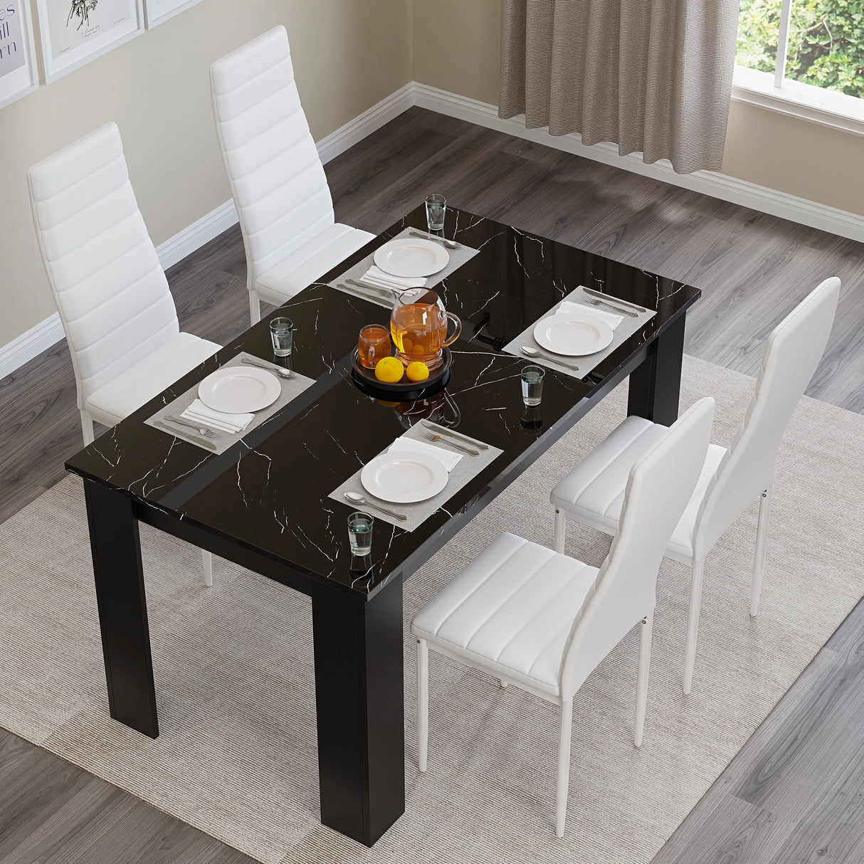 Top view of gloss black marble dining table set with 4 white chairs, styled for modern dining rooms or kitchens, seats 4-6 people.