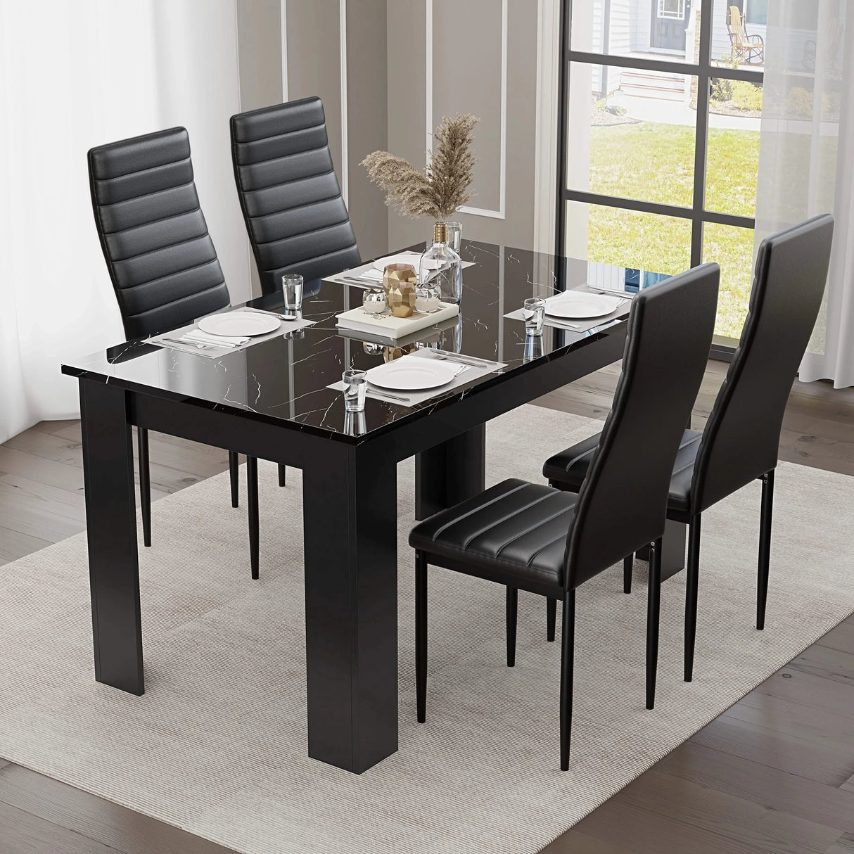 4-seater Gloss Black Marble Finish dining table with black faux leather chairs, perfect for contemporary dining spaces.