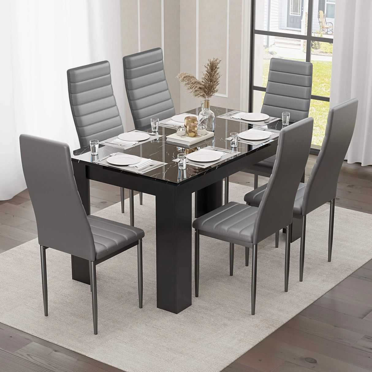 Gloss black marble finish dining table with six grey faux leather chairs, ideal for modern kitchen or dining room settings.