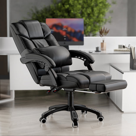fully reclined black leather office chair with footrest extended for maximum relaxation