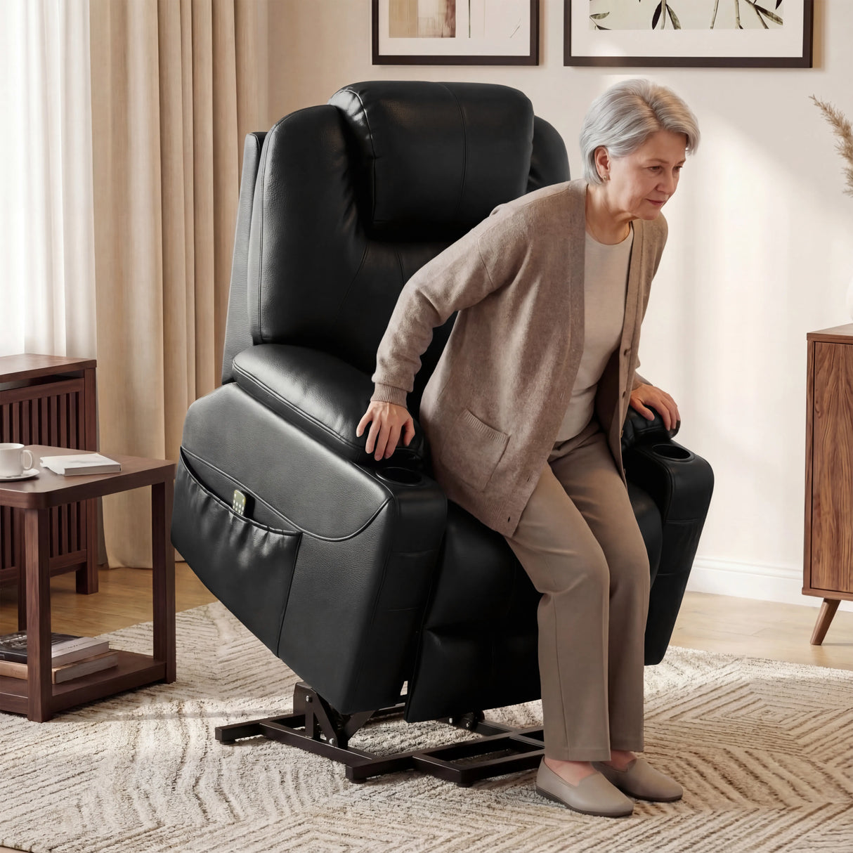 Electric Recliner Chair For Elderly in black leather with riser function, shown assisting an elderly woman to stand in a cozy living room setting.