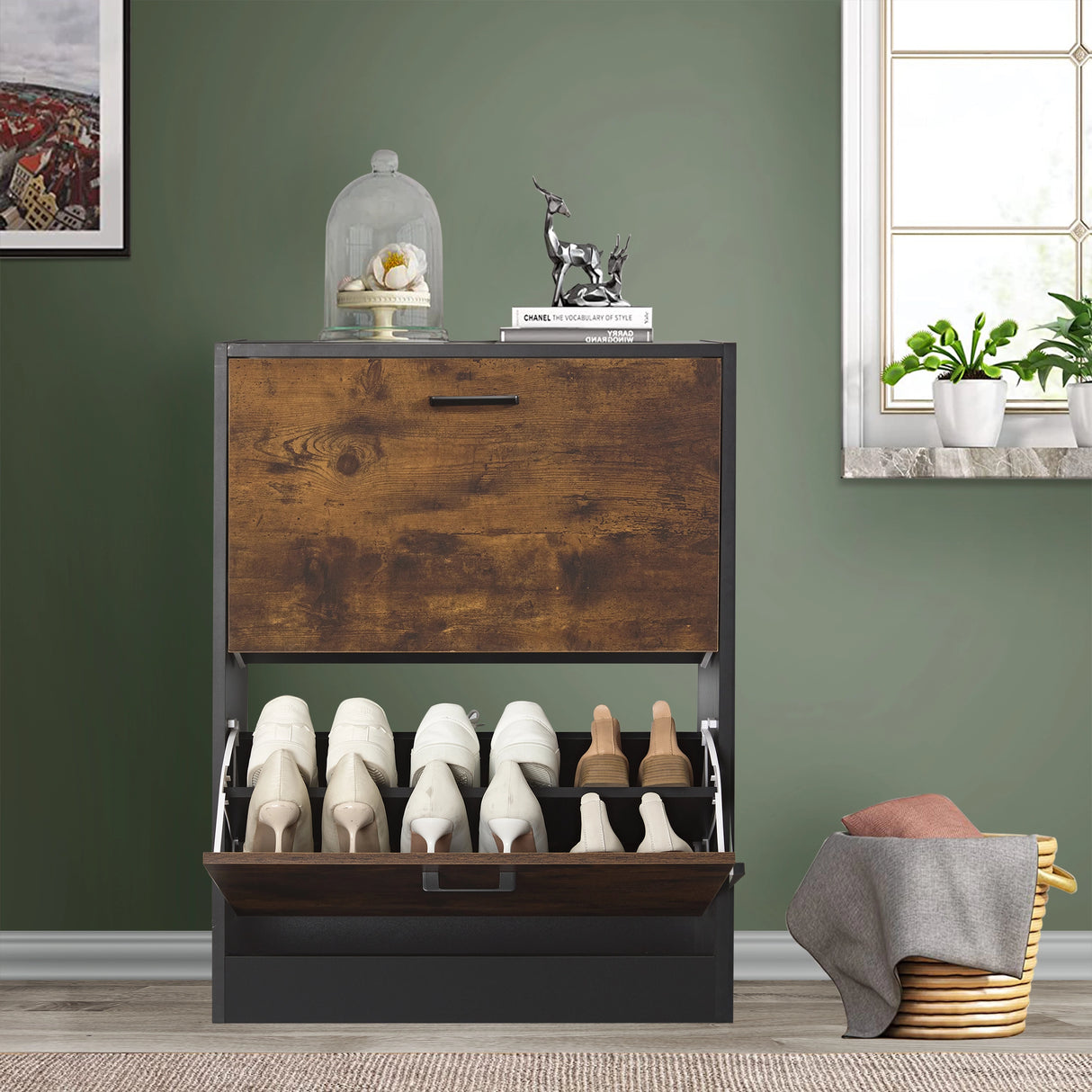 A rustic 12 pair shoe storage cabinet in black finish, bottom drawer open revealing tall boots and other footwear.
