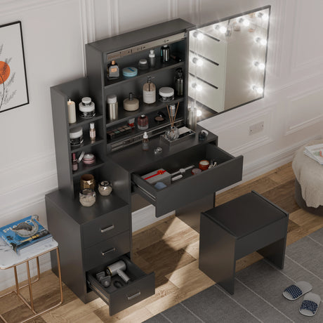 Black vanity with mirror, shelves, and drawers in a room setting.
