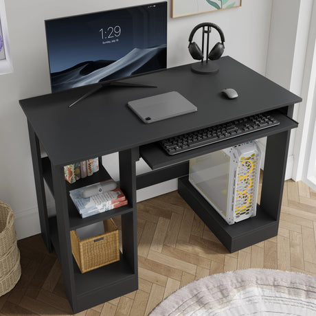 Home Office Computer Desk With Shelves For Working, Reading & Gaming in black finish, featuring a pull-out keyboard tray, monitor, and PC tower setup.