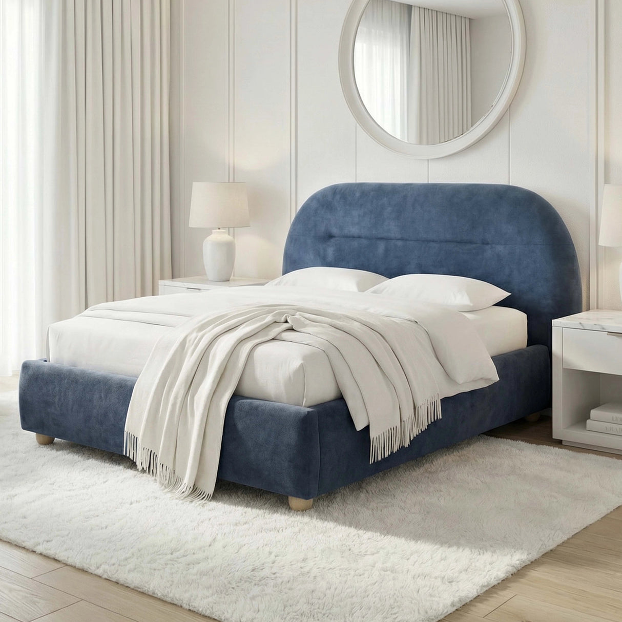 Side view of blue double upholstered bed frame showcasing its clean lines and soft curves