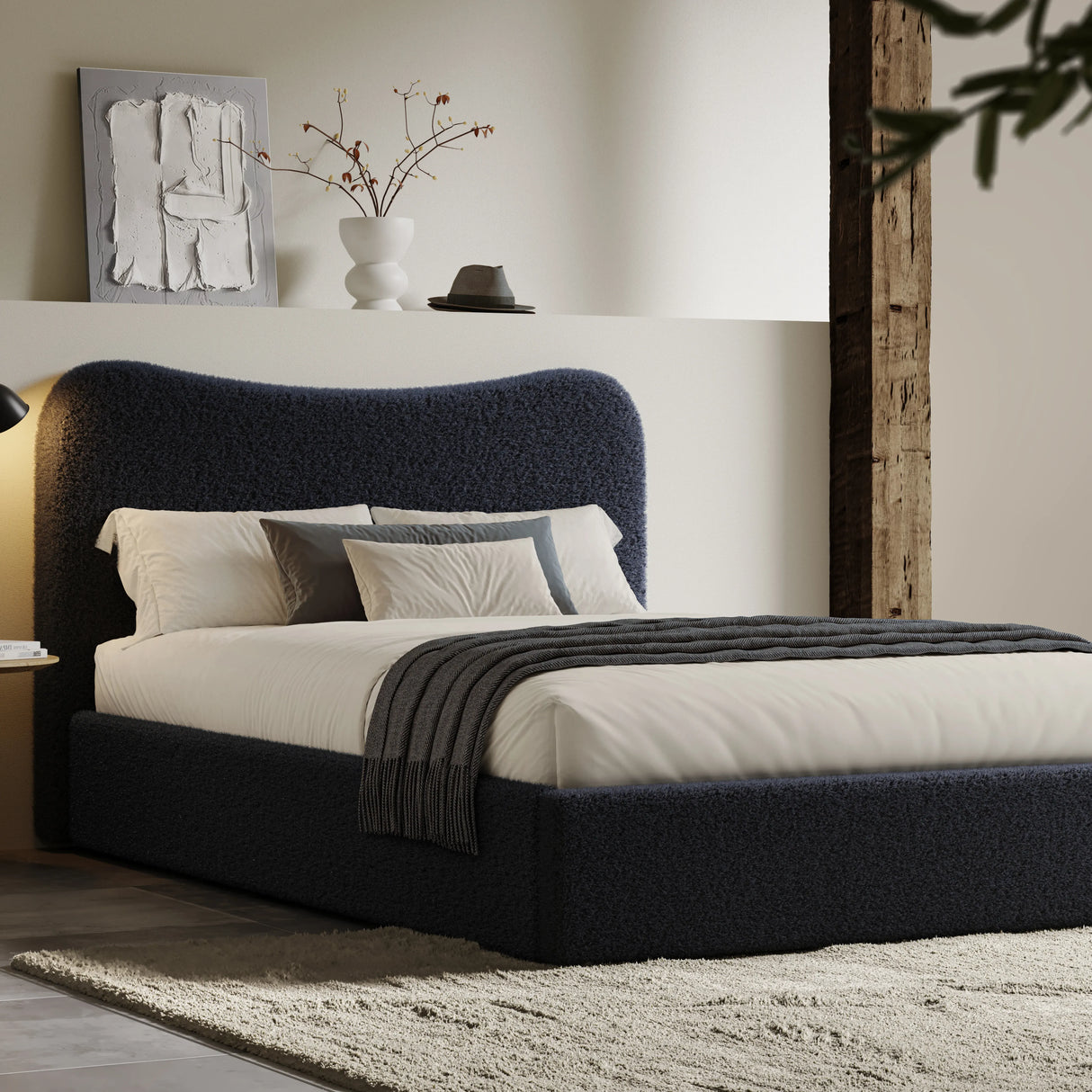 Curved Headboard Ottoman Storage Bed in boucle fabric with hidden storage, shown in dark navy blue. Stylish platform bed frame for modern bedrooms.