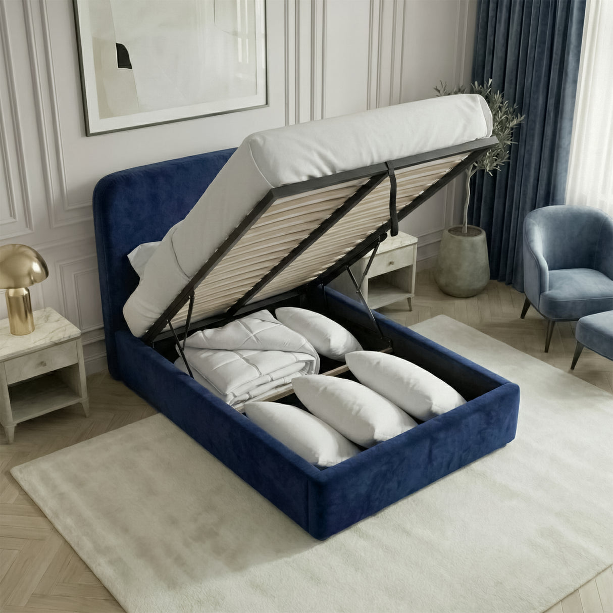 Single blue velvet ottoman bed lifted to reveal under-bed storage space beneath the slatted mattress base