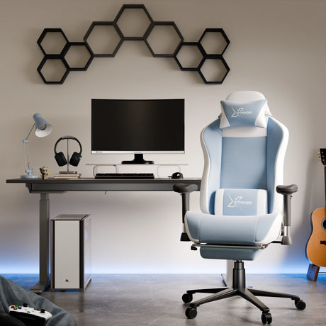 Modern gaming setup with a blue and white gaming chair, desk, and monitor.