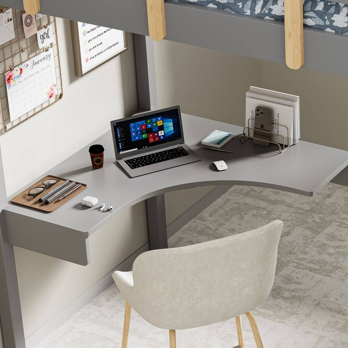 close-up of children's bunk bed with desk and ladder featuring desk setup with laptop, coffee cup, phone stand, and chair