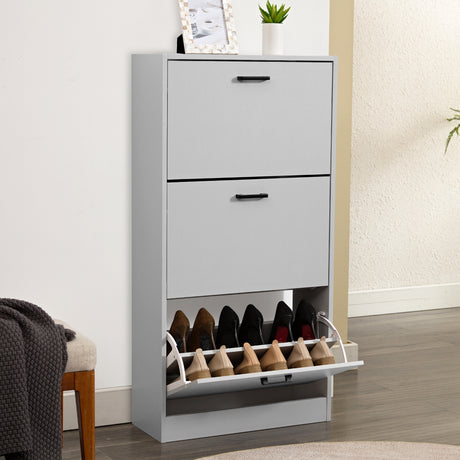 This light grey shoe cabinet features a 3 tier shoe cabinet format, with the bottom drawer filled with shoes.