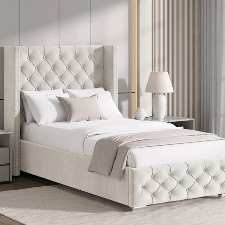 Single size beige velvet ottoman storage bed with cross pattern and winged headboard, styled in a neutral-toned bedroom.