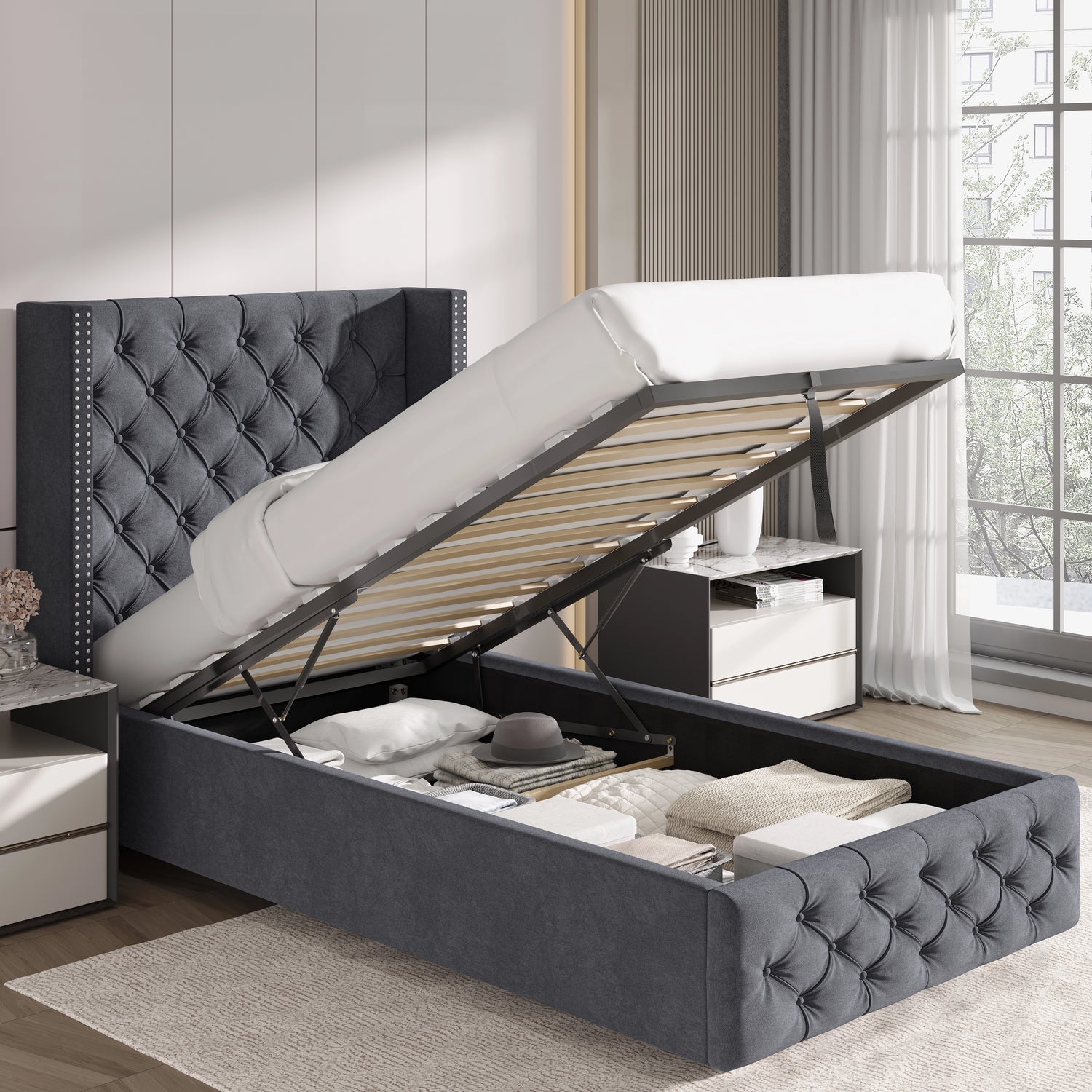 Dark grey single velvet ottoman bed with gas lift storage open, showcasing underbed storage space and winged headboard.