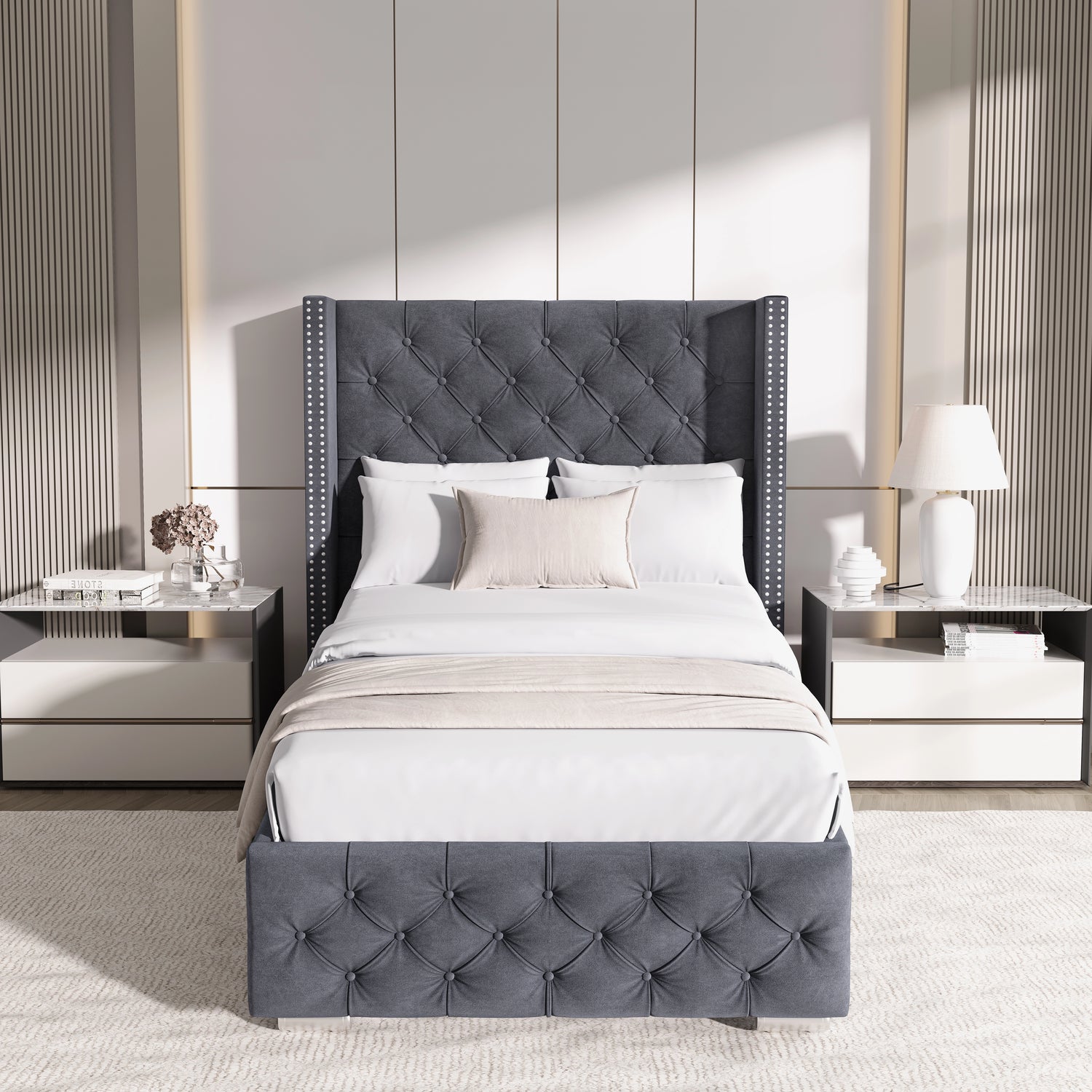 Front view of single dark grey velvet ottoman bed with cross pattern and winged headboard, styled in a modern bedroom.