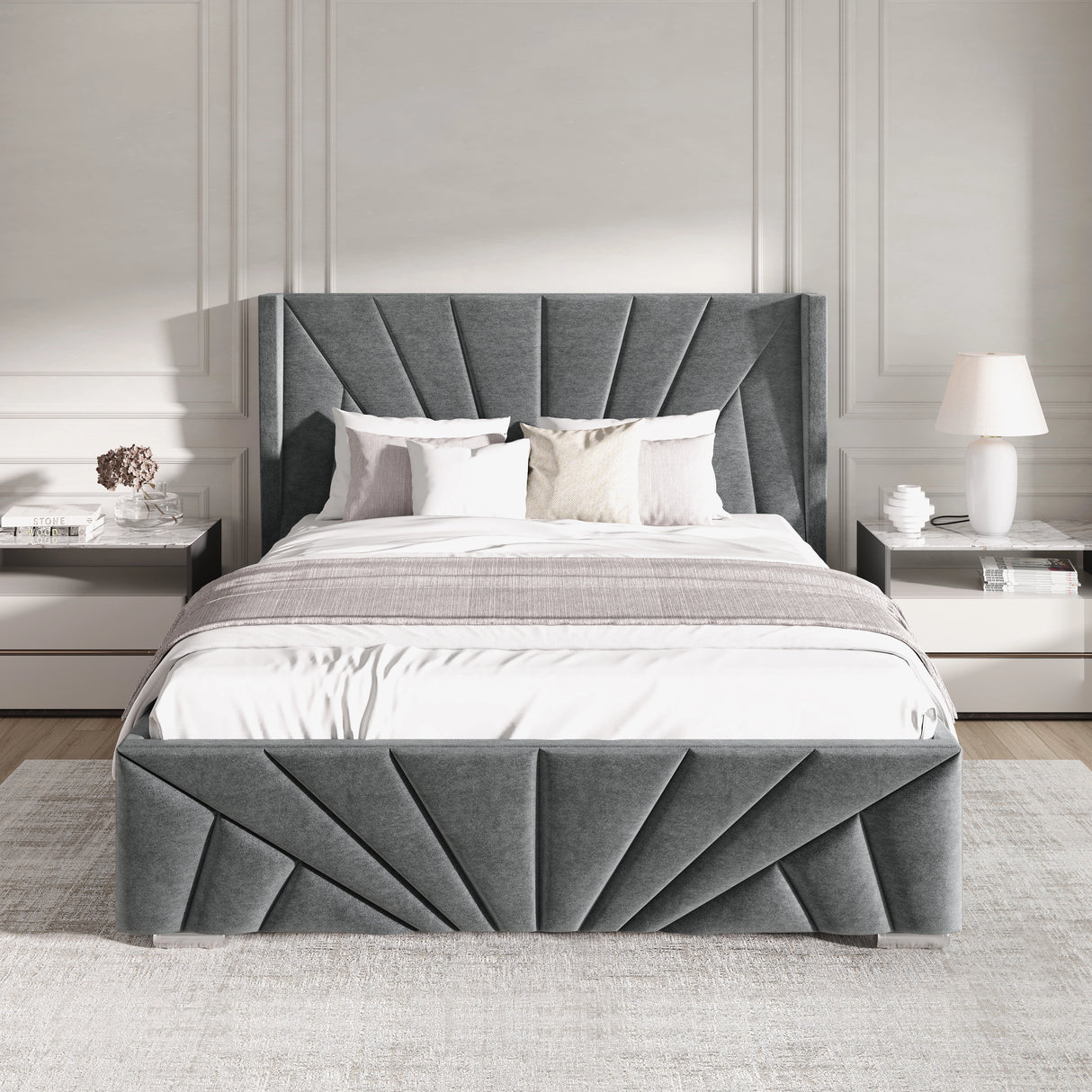 Gray upholstered bed with decorative headboard in a bedroom setting.