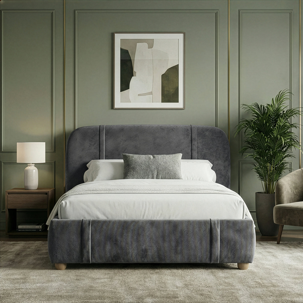 Straight-on view of dark grey king bed frame with softly padded backrest and neutral linens