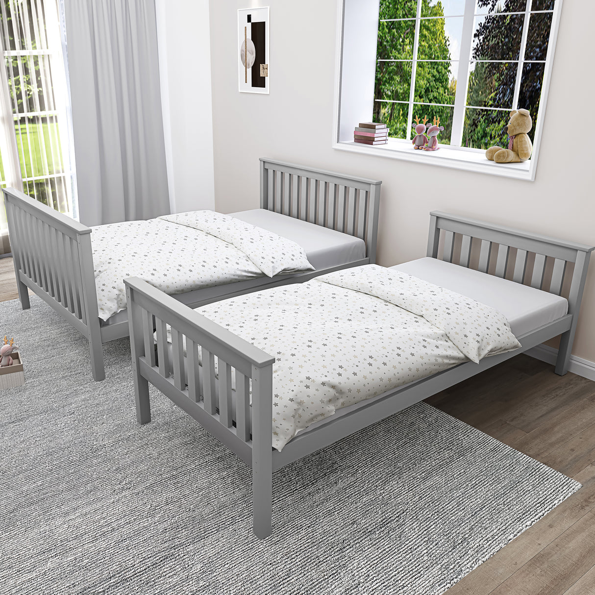 Grey wooden bunk beds separated into two single beds, demonstrating the convertible feature of the triple bunk bed for kids.