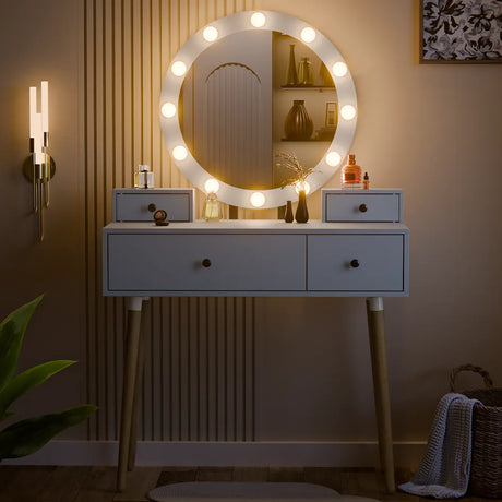 Round vanity mirror with lights on a white console table against a beige wall.