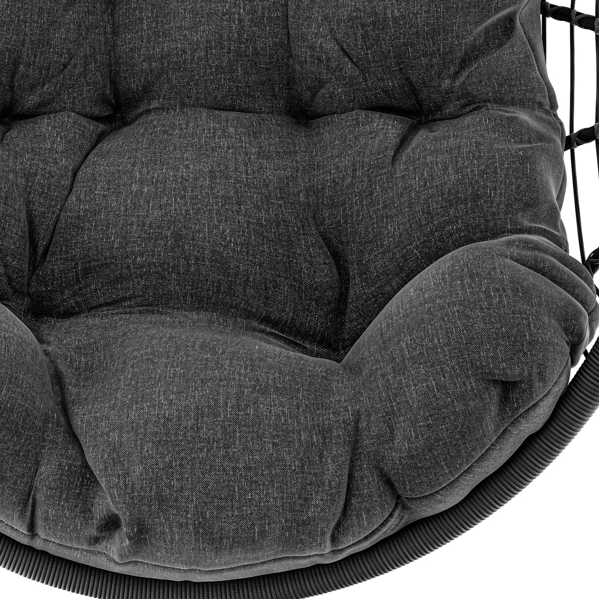 Egg chair hanging with plush black cushions and durable woven frame for comfort.
