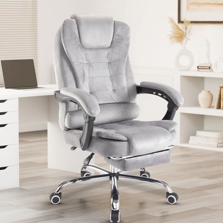 elegant grey velvet reclining chair supports long hours with plush cushions and reclining action.