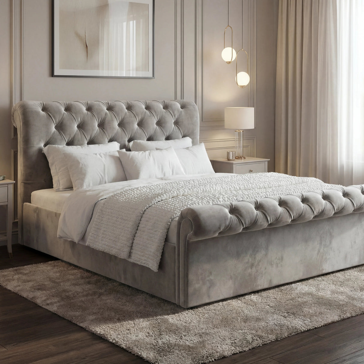 Light grey Chesterfield ottoman storage bed with tufted headboard, styled in a soft-toned bedroom with modern lighting and rug.