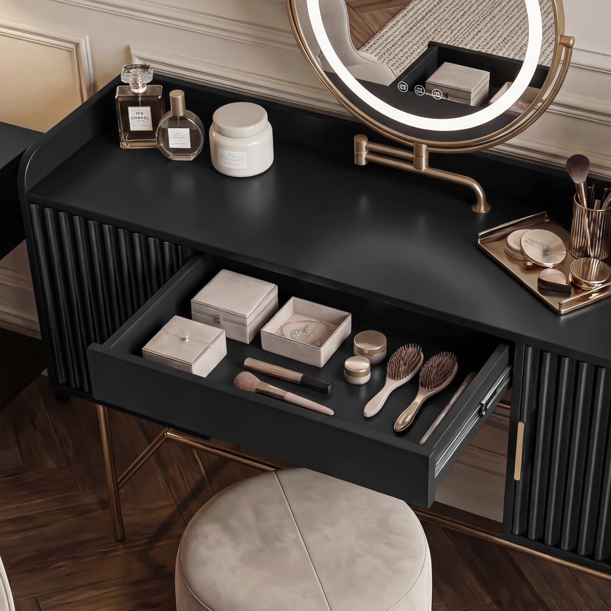 Close-up view of a black vanity table, showing open drawer with beauty products and accessories neatly organized