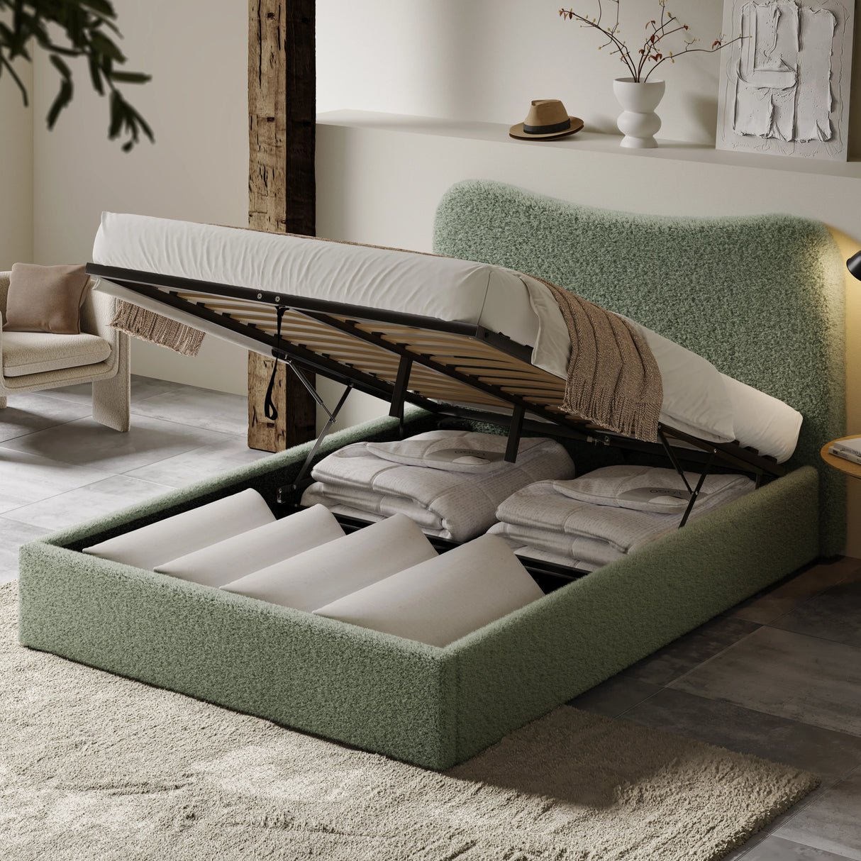 Curved headboard king size bed frame ottoman in light green boucle fabric with lifted mattress revealing hidden storage space, ideal for modern bedrooms.