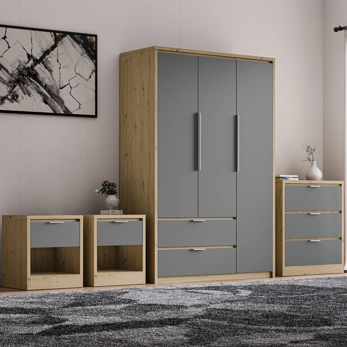 Skova 4 Piece Bedroom Furniture Set with 3-door wardrobe, chest of drawers, and 2 bedside tables in grey and oak finish. Modern UK bedroom set.