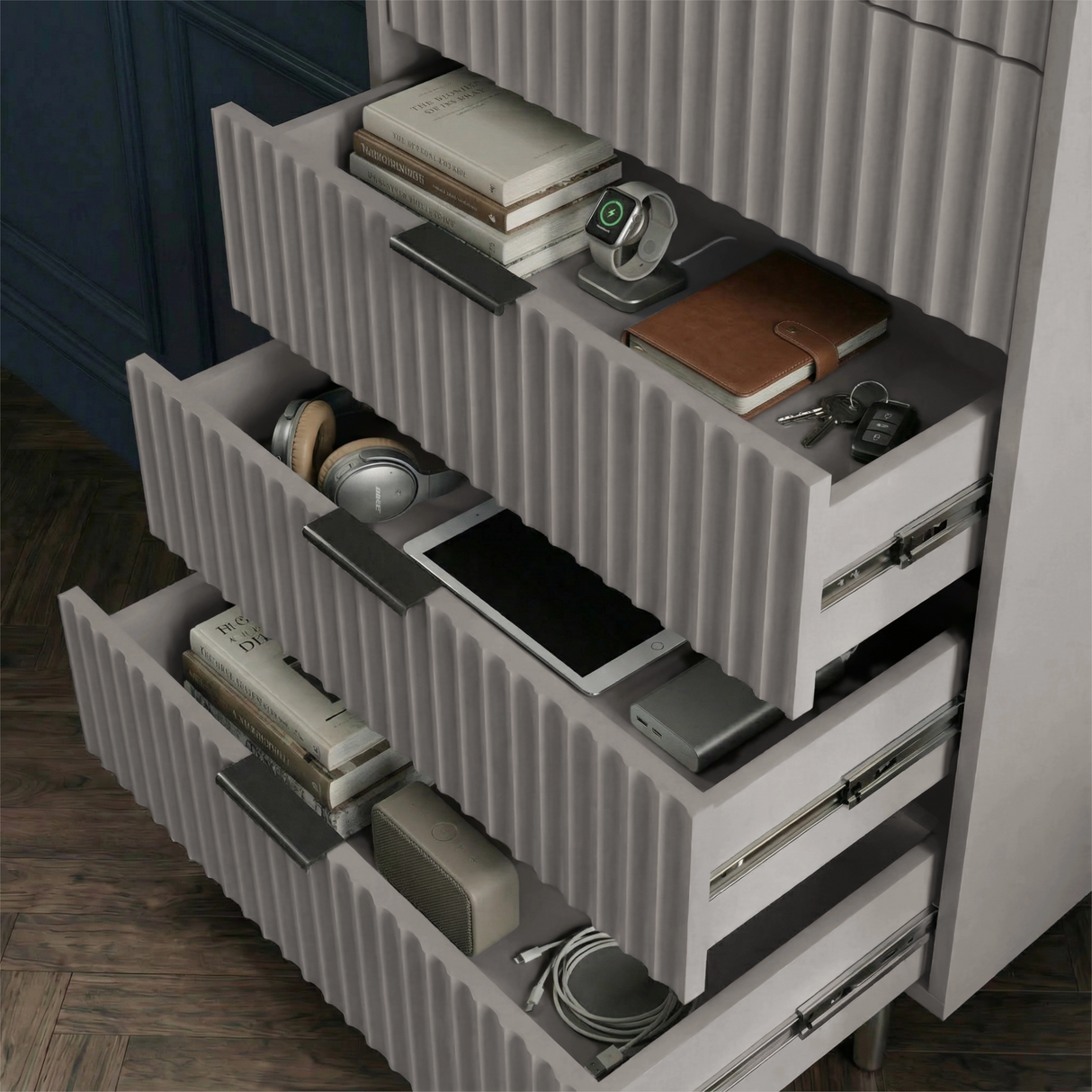 Grey five drawer cabinet displayed with drawers extended to show internal storage layout