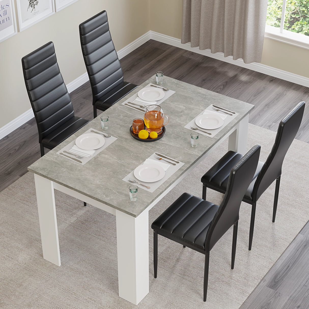 Grey Marble Dining Table with 4 black leather chairs in a modern dining room. Ideal for compact 4 seater dining setups.