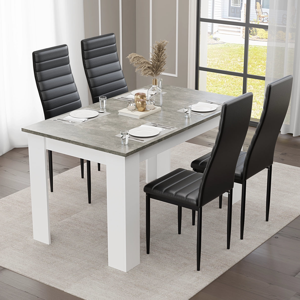 Grey Marble Finish Dining Table Set with 6 black leather chairs in a bright dining room. Sleek and modern kitchen furniture.
