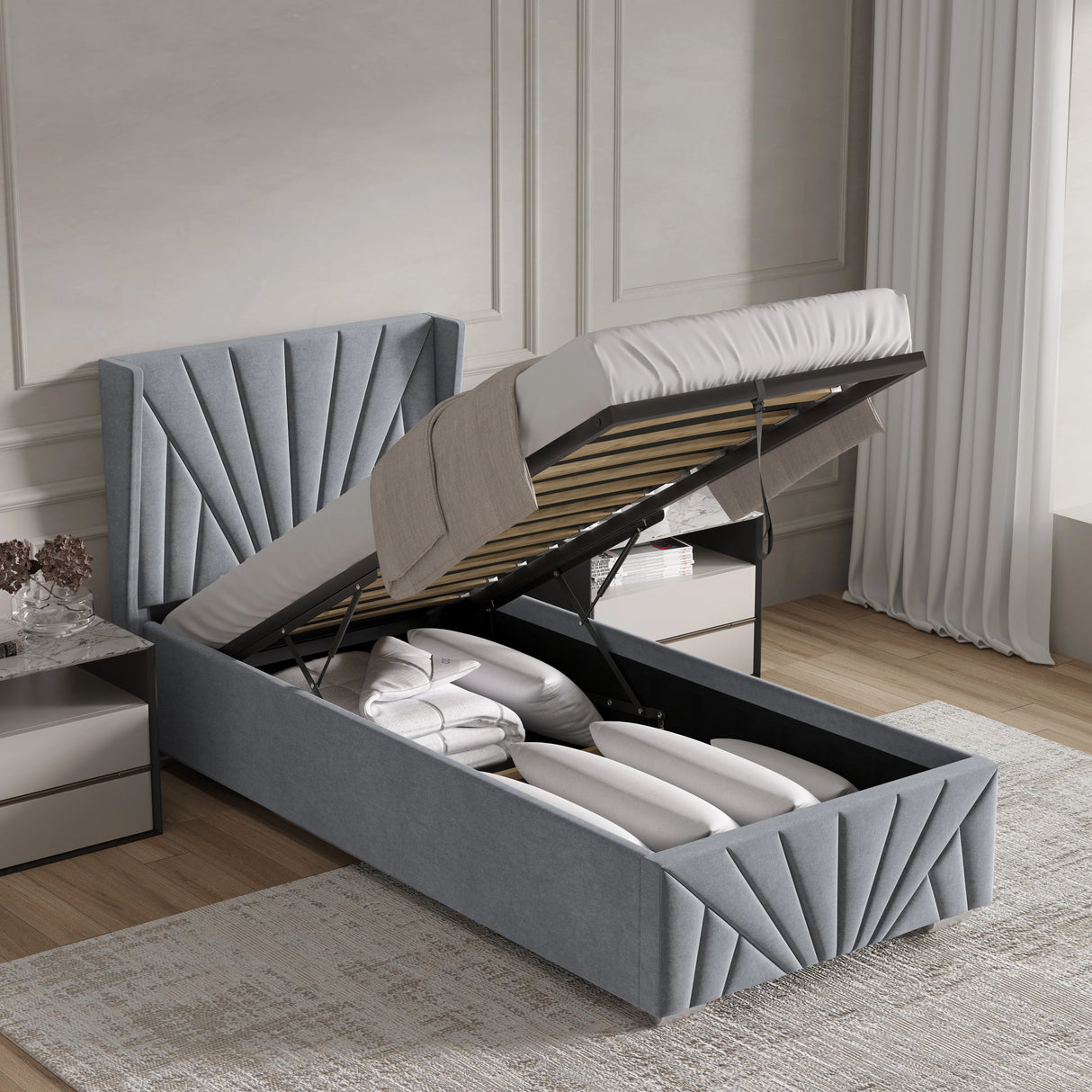 Velvet Ottoman Storage Bed | Sunrise Ottoman Bed Frame in grey with gas-lift mechanism open, showing under-bed storage filled with bedding.