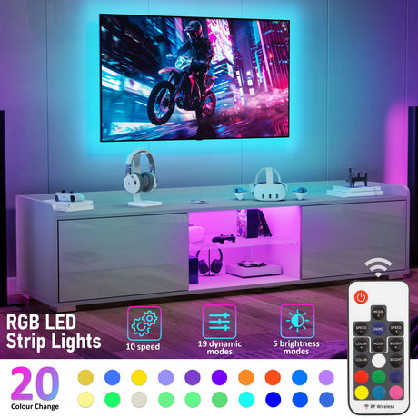 Modern entertainment console with RGB LED strip lights and remote control, displaying a motorcycle on a screen.