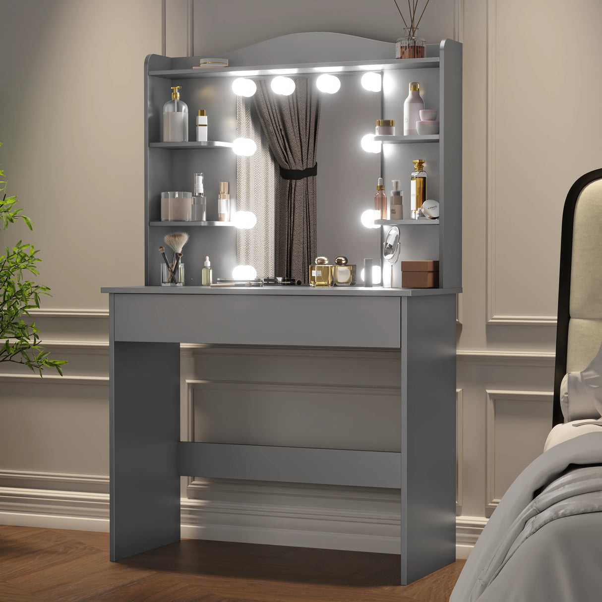 Grey dressing table with mirror and LED lights placed in a contemporary bedroom, besides a bed