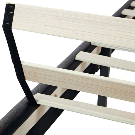 Detail of wooden slats and support straps on the Linen Grey Bed Frame, designed for mattress stability and durability.
