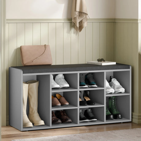 Hallway shoe storage bench with cushion and adjustable shelves in grey, featuring multiple compartments for organized shoe storage in entryway.