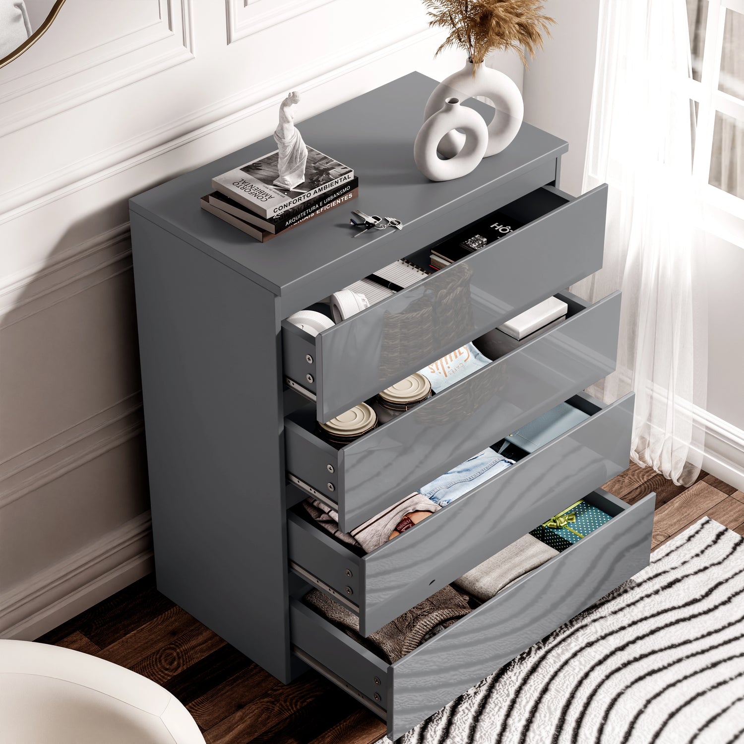 Dark grey dresser with open drawers in a room setting