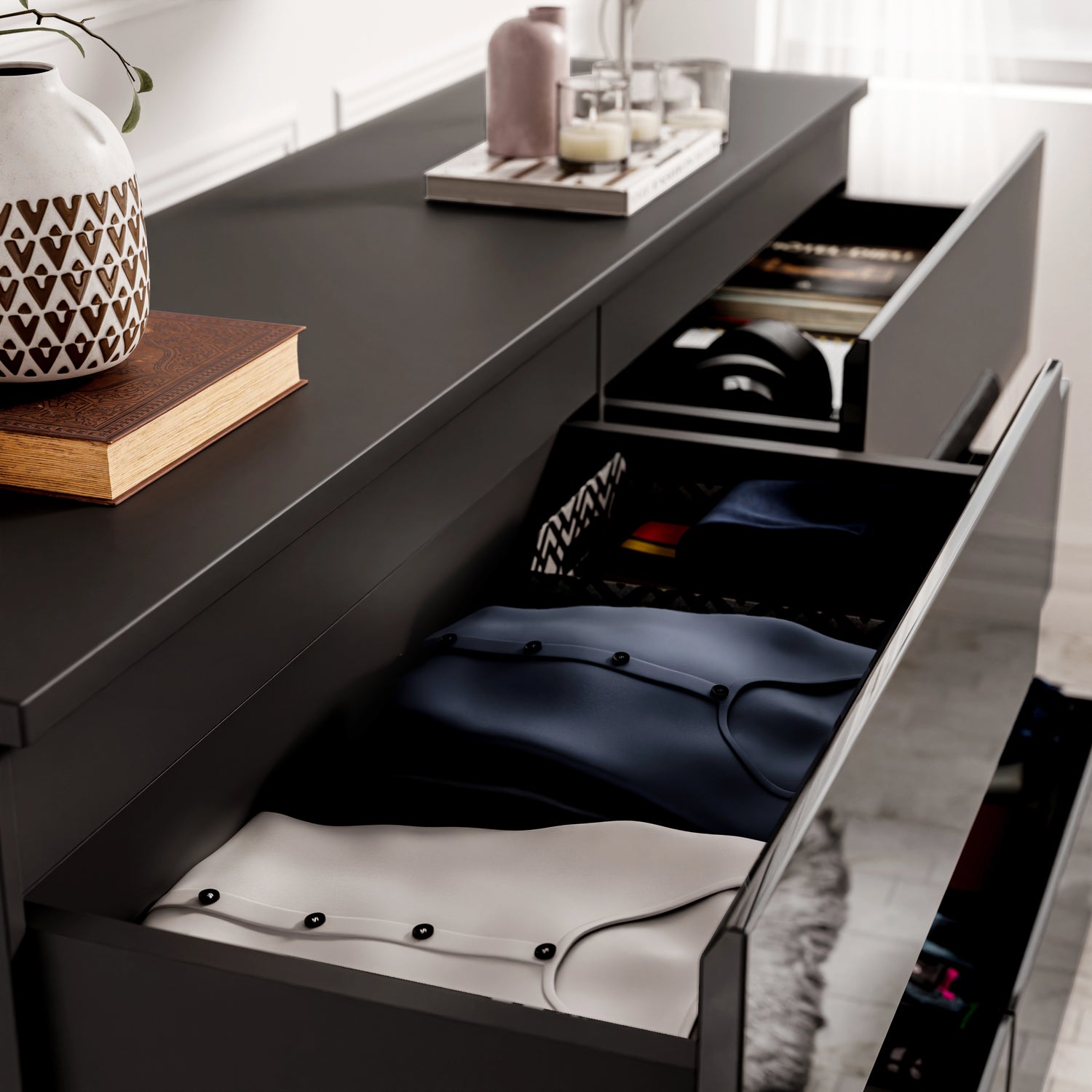 High Gloss Large 6 Drawer Chest of Drawers in black with open drawers showing neatly folded clothes and accessories. Ideal modern bedroom dresser.